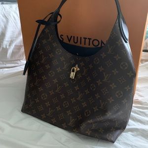 Luis Vuitton Flower Hobo. With receipt  NIB.